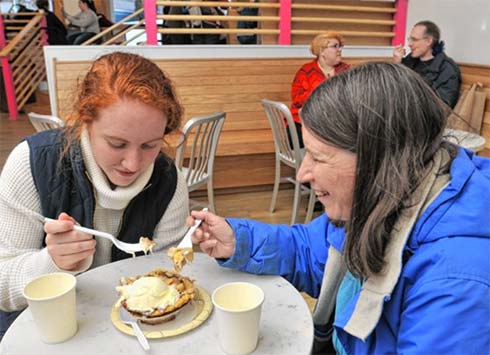 Customers eating pie a la mode